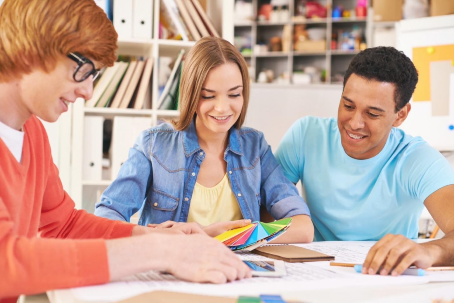 Strategic fundraising planning session with startup founders reviewing capital structure documents